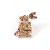 Rattan bunny napkin rings on a white background