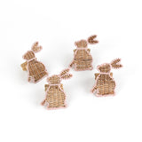 set of 4 Rattan bunny napkin rings on a white background