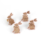 set of 4 Rattan bunny napkin rings on a white background