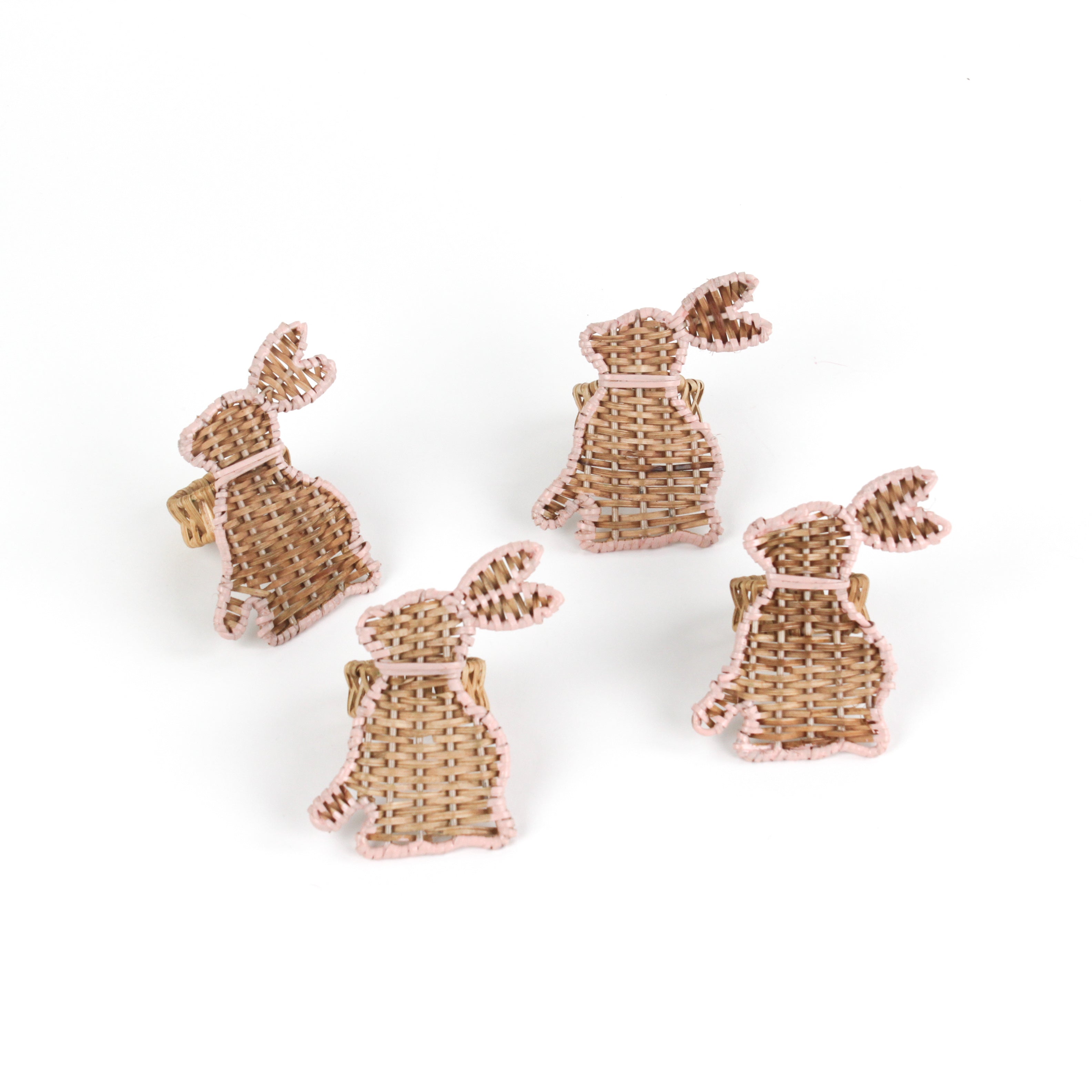 set of 4 Rattan bunny napkin rings on a white background