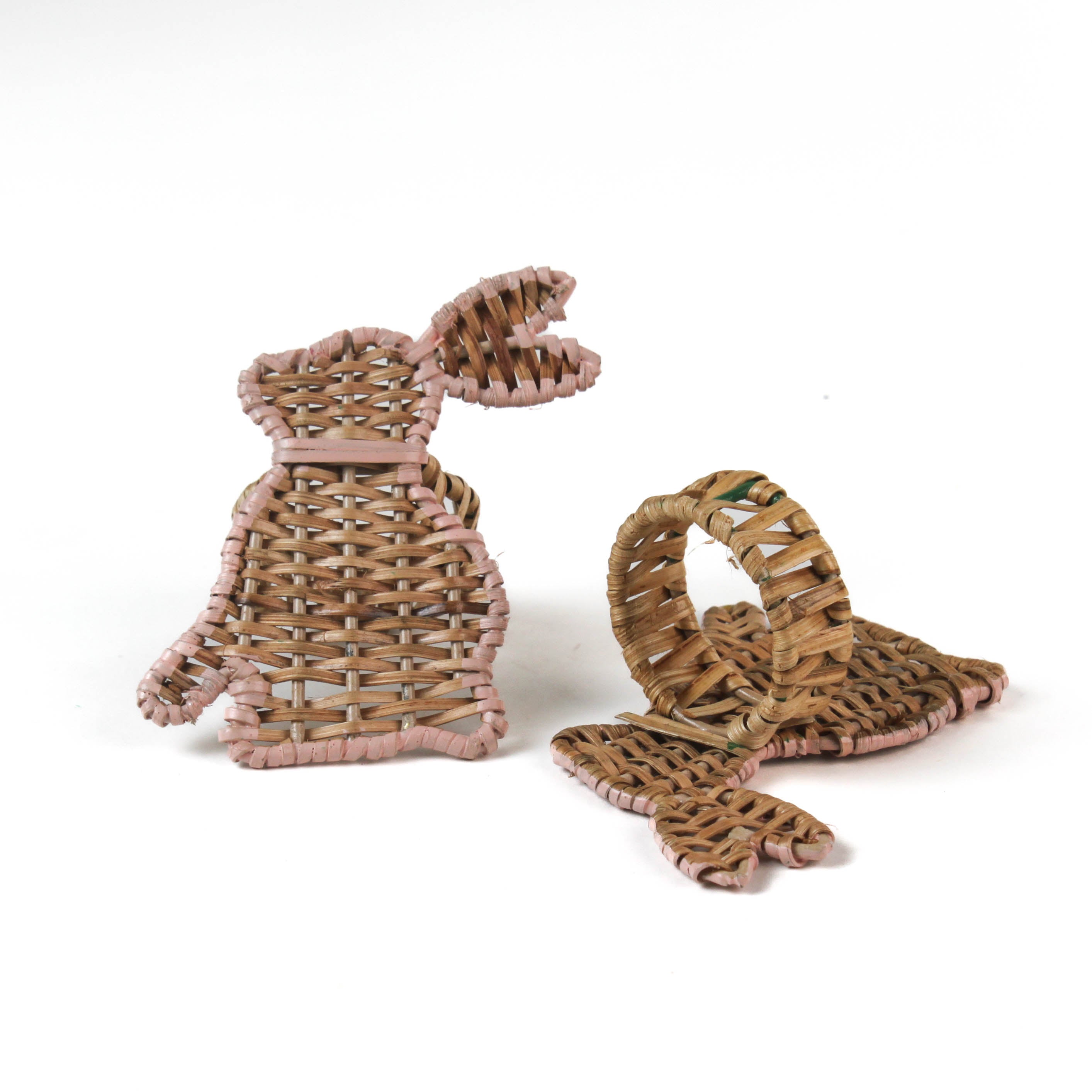 Rattan bunny napkin rings on a white background