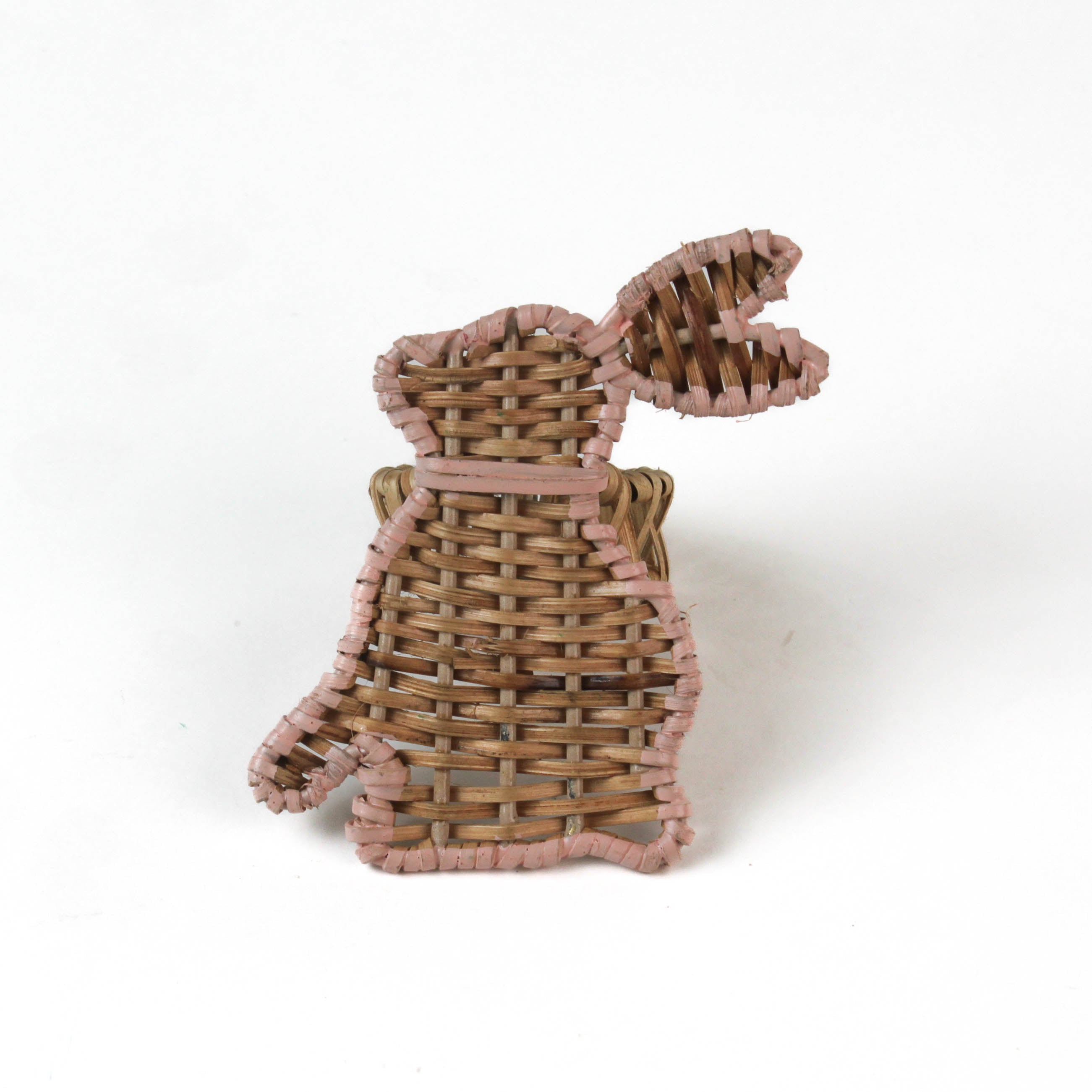Rattan bunny napkin rings on a white background
