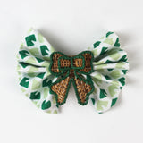 green rattan bow napkin ring on napkin 