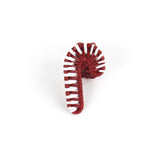 rattan white and red candy cane christmas napkin rings against a white backgroud. 