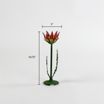 a small metal flower candle holder in the shape of a red lotus on a white background with a dimension of 5" by 10.75"