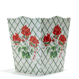 a red and white geranium wastepaper basket in "cottage Grove" pattern by madcap cottage.