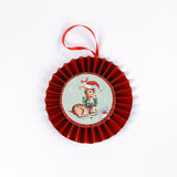retro-style ruffled paper Christmas ornaments featuring vintage illustration, accented with red pleated borders and hanging ribbons