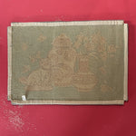 reverse of A small pink and green rug with chinoiserie motifs.