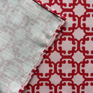 View of the backside of the Monserrat red and pink cloth placemat.