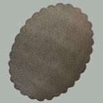The reverse side of an oval scalloped rug