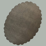 The reverse side of an oval scalloped rug