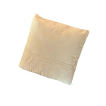 A plain reverse side of a golf pillow that reads THIS IS HOW WE ROLL