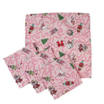 set of 4 Nutcracker pink christmas napkins featuring motifs of ballerinas, ribbons, christmas trees and nutcrackers on a white background. 