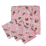 set of 4 Nutcracker pink christmas napkins featuring motifs of ballerinas, ribbons, christmas trees and nutcrackers on a white background. 