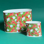 Empty duo of Rock Lobster caddies in large and small on a green background