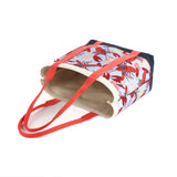 a large Rock Lobster canvas tote bags with a lobster pattern, against a white background.