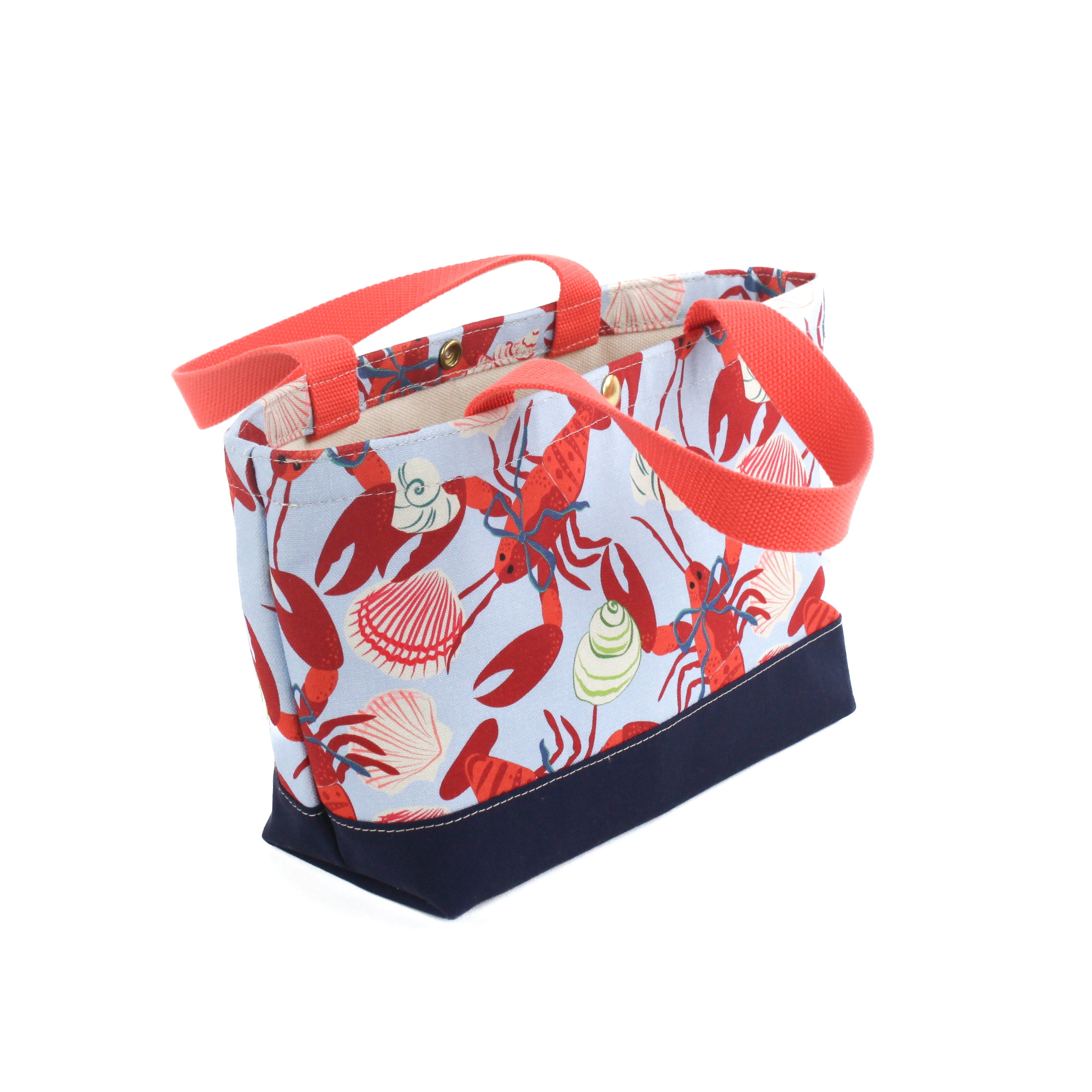 a small Rock Lobster canvas tote bag with a lobster pattern showing the bottom, against a white background.