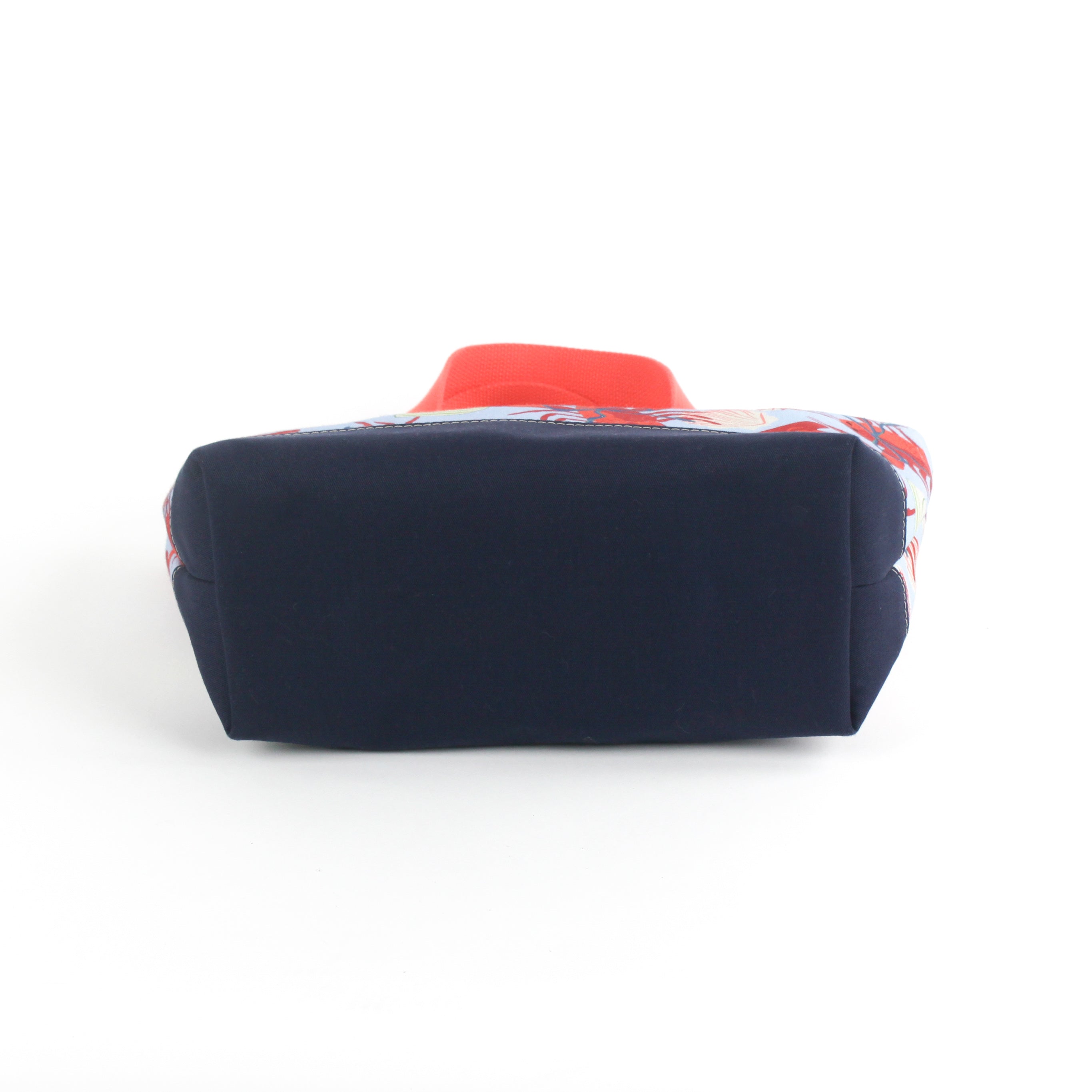 the image shows the bottom of a small Rock Lobster canvas tote bag with a lobster pattern showing the bottom, against a white background.