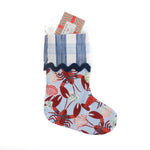blue christmas Stocking with coastal lobster design and a blue gingham cuff on a white background