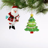 felt Christmas ornaments featuring a sequined green Christmas tree and a jolly Santa Claus in a red suit