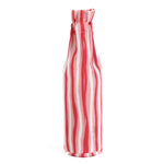 back of the Madcap Cottage Red and white striped bottle bag with a text "Be Naughty! Save Santa the trip" on a white background