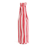 back of the Madcap Cottage Red and white striped bottle bag with a text "Be Naughty! Save Santa the trip" on a white background