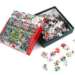 Toy Workshop 500-piece jigsaw puzzle by Michael Storrings with illustrated holiday toy shop scene, open puzzle box showing colorful pieces on white background.