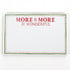 Luxe large notepad with quote ‘More of More is Wonderful’ in red lettering, featuring a dotted border and green trim, perfect for stylish note-taking. placed in a white background