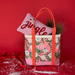 Shell Seekers canvas large tote bag with pink fabric with a repeating seaweed and shell motif with a pillow sticking out of top