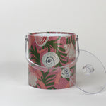 Shell Seekers, a pink acrylic ice bucket from madcap cottage covered in shell and seaweed motifs
