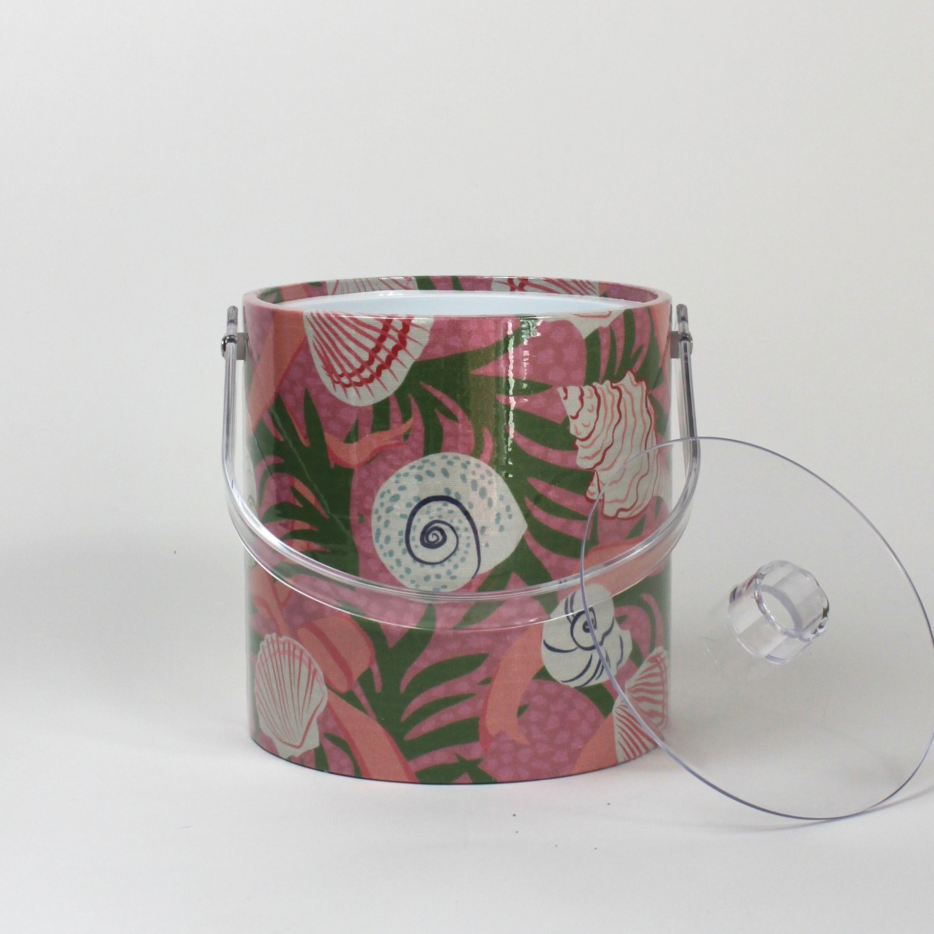 Shell Seekers, a pink acrylic ice bucket from madcap cottage covered in shell and seaweed motifs