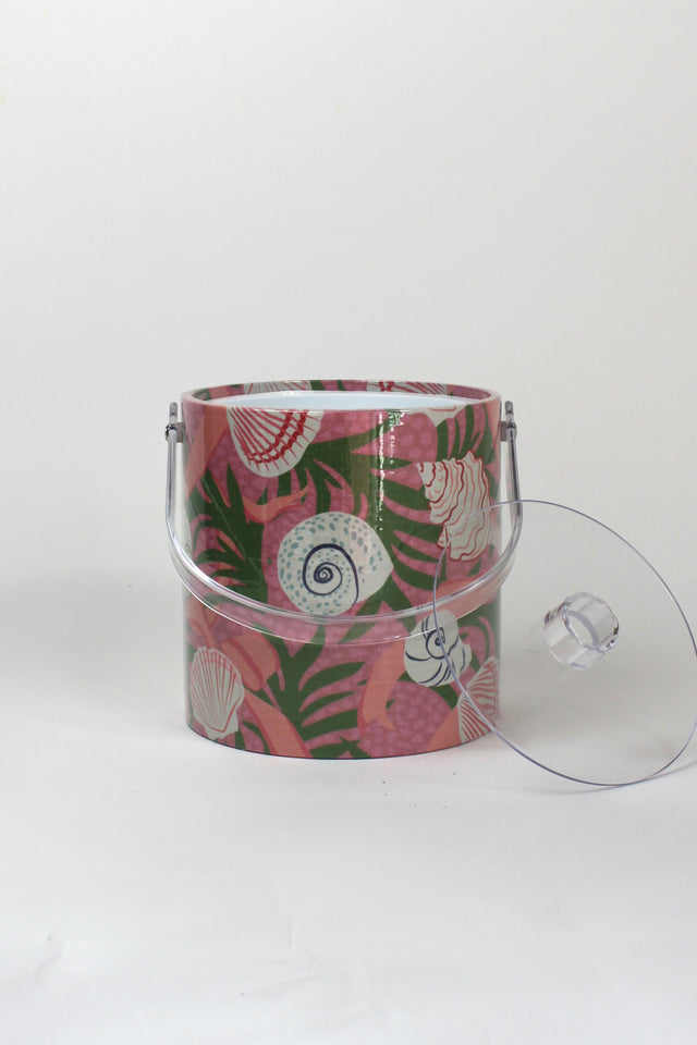 Shell Seekers, a pink acrylic ice bucket from madcap cottage covered in shell and seaweed motifs