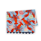 Folded Shells and Lobsters cotton tea towel featuring bright red lobsters and colorful seashells on a light blue background.