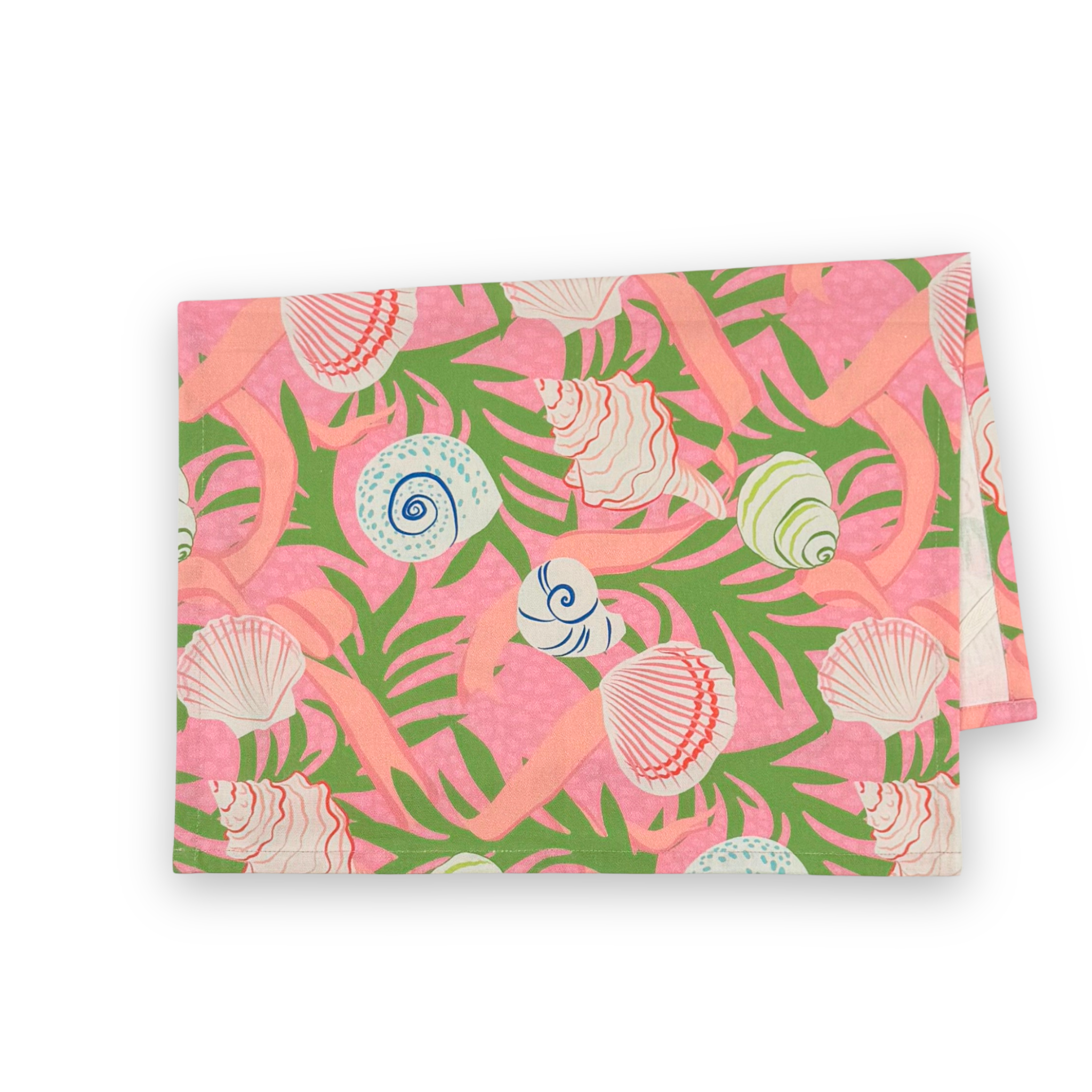 Folded Shells and Ribbons cotton tea towel featuring colorful seashells, pink ribbons, and green tropical foliage on a vibrant pink background.