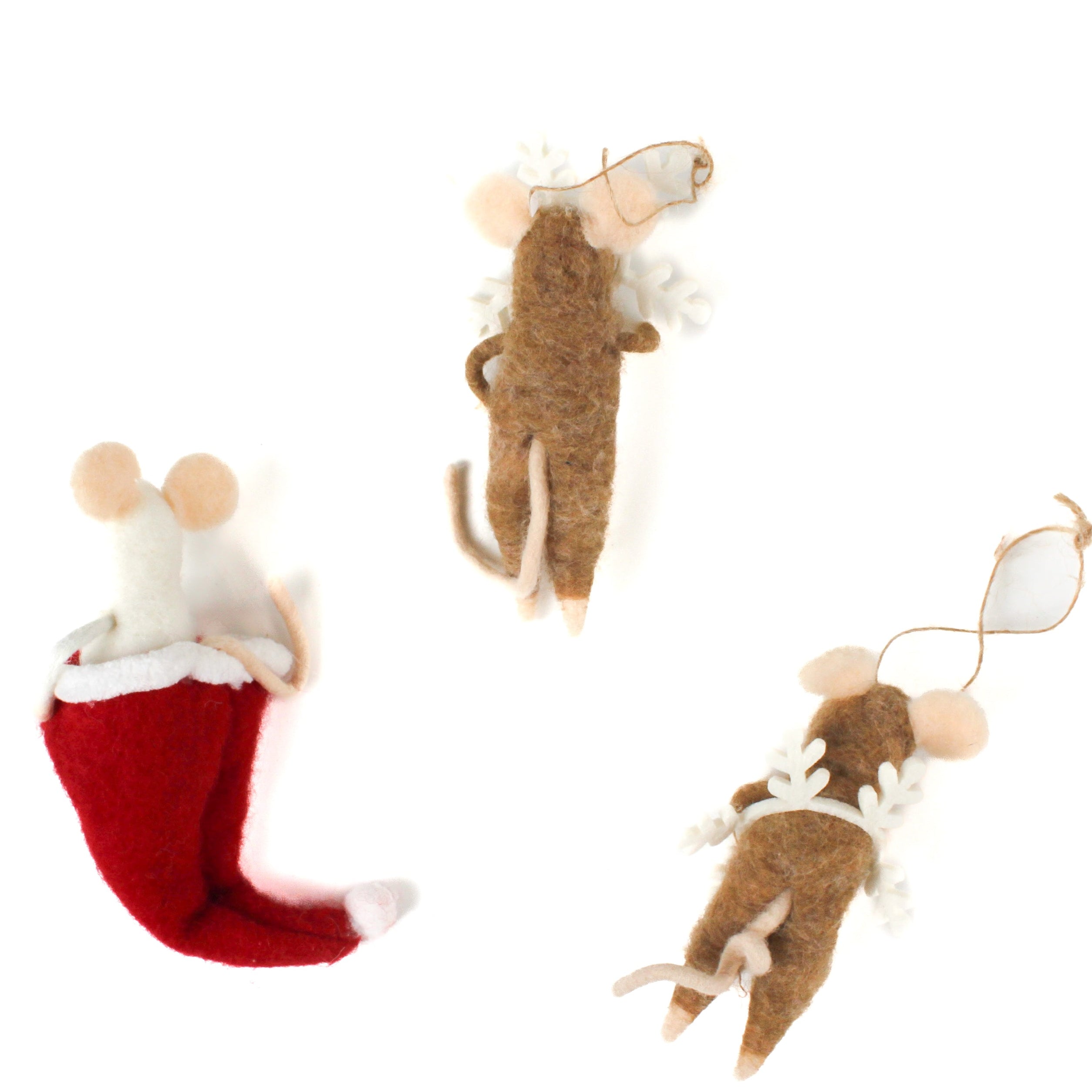back of the Three felt mouse ornaments, one peeking out of a red Christmas stocking and two wearing white snowflake costume frames, shown lying flat
