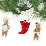 Three small felt mice christmas ornaments hanging on a green pine branch