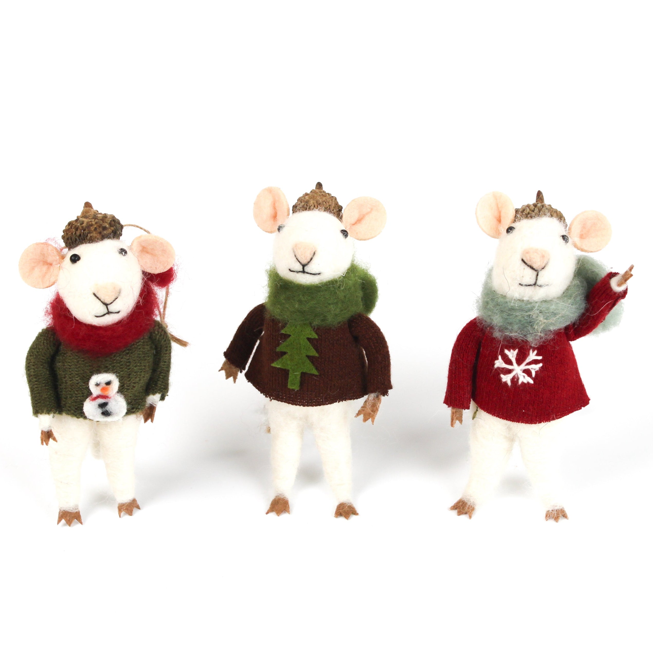Three felt mouse ornaments wearing cozy sweaters with festive designs—a snowman, a tree, and a snowflake—each topped with a tiny acorn cap and ready to hang.