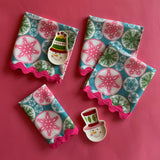 Snowflake Wonderland w/Ric Rac No-Iron Dinner Napkins, Set of 2 shown with snowman trinket trays