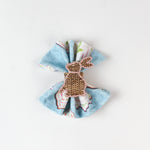 cloth napkins featuring a white background with bunny ring designs.