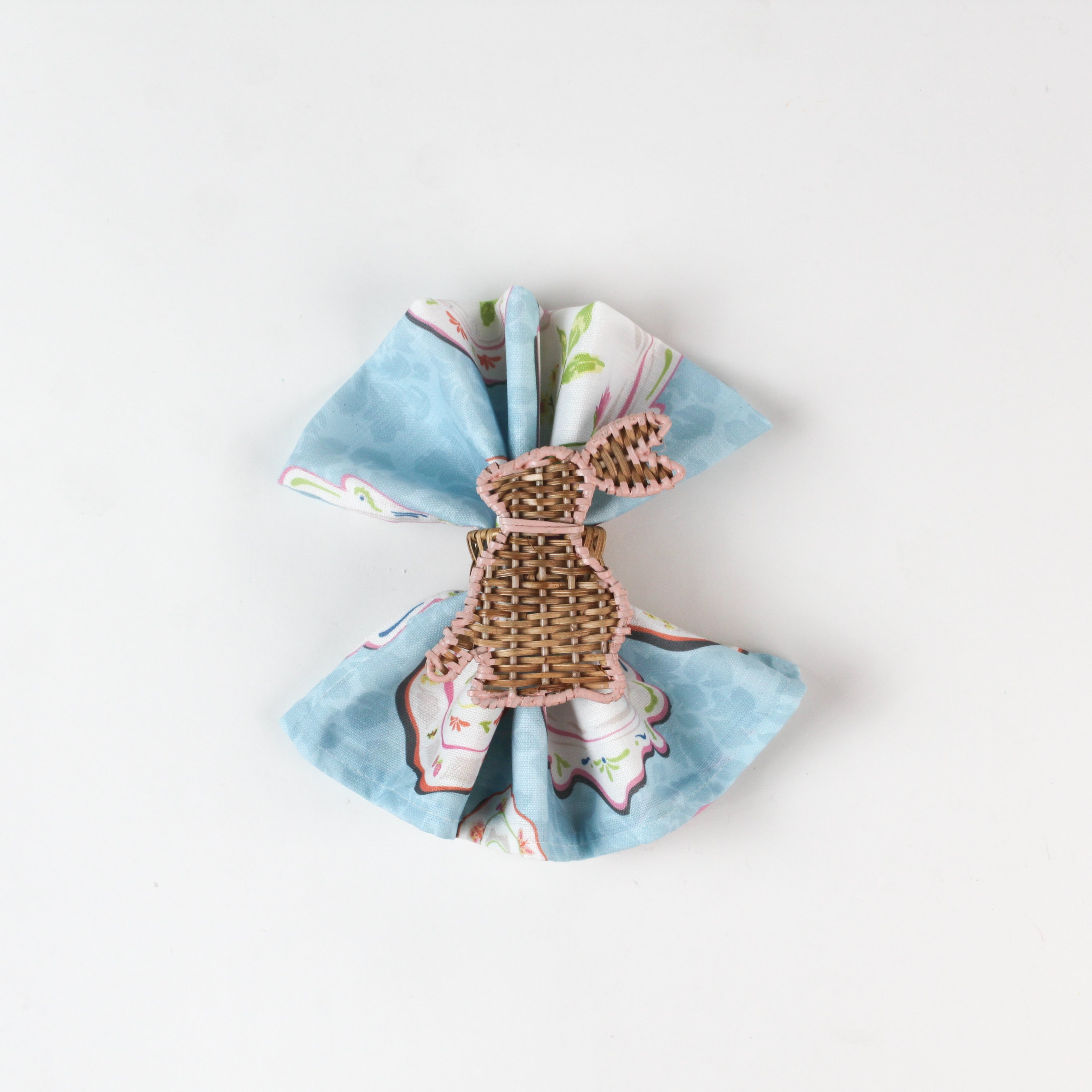 cloth napkins featuring a white background with bunny ring designs.