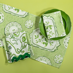 Green Society Hill Vintage Plates cloth table runner with matching napkins.