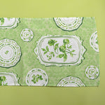 Green Sociey Hill Vintage Plates cloth table runner on a green background
