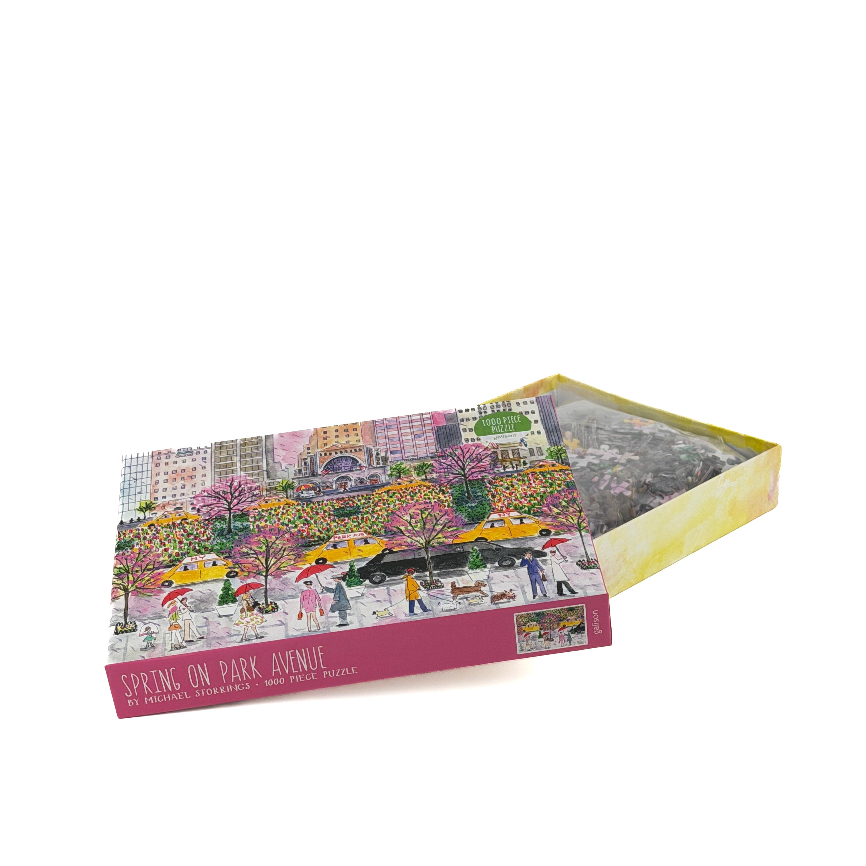 Opened 1000 piece jigsaw puzzle with spring city park scene in decorative box