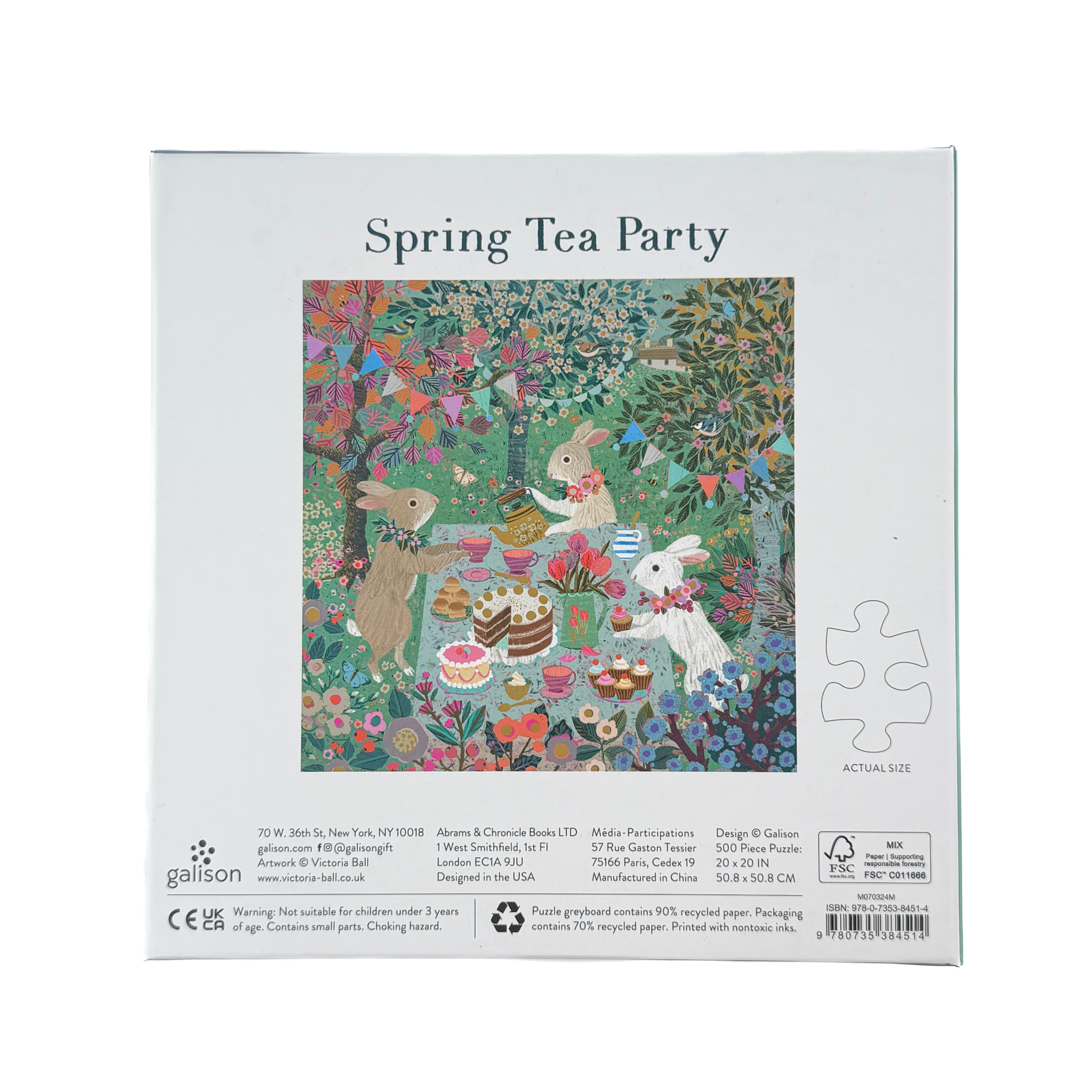 Back of 500 piece jigsaw puzzle with spring tea party scene