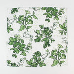 green botanical and bunny print laid out on a white background.