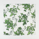 green botanical and bunny print laid out on a white background.
