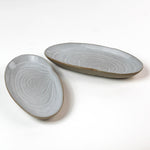 Shell shaped plate cream colored