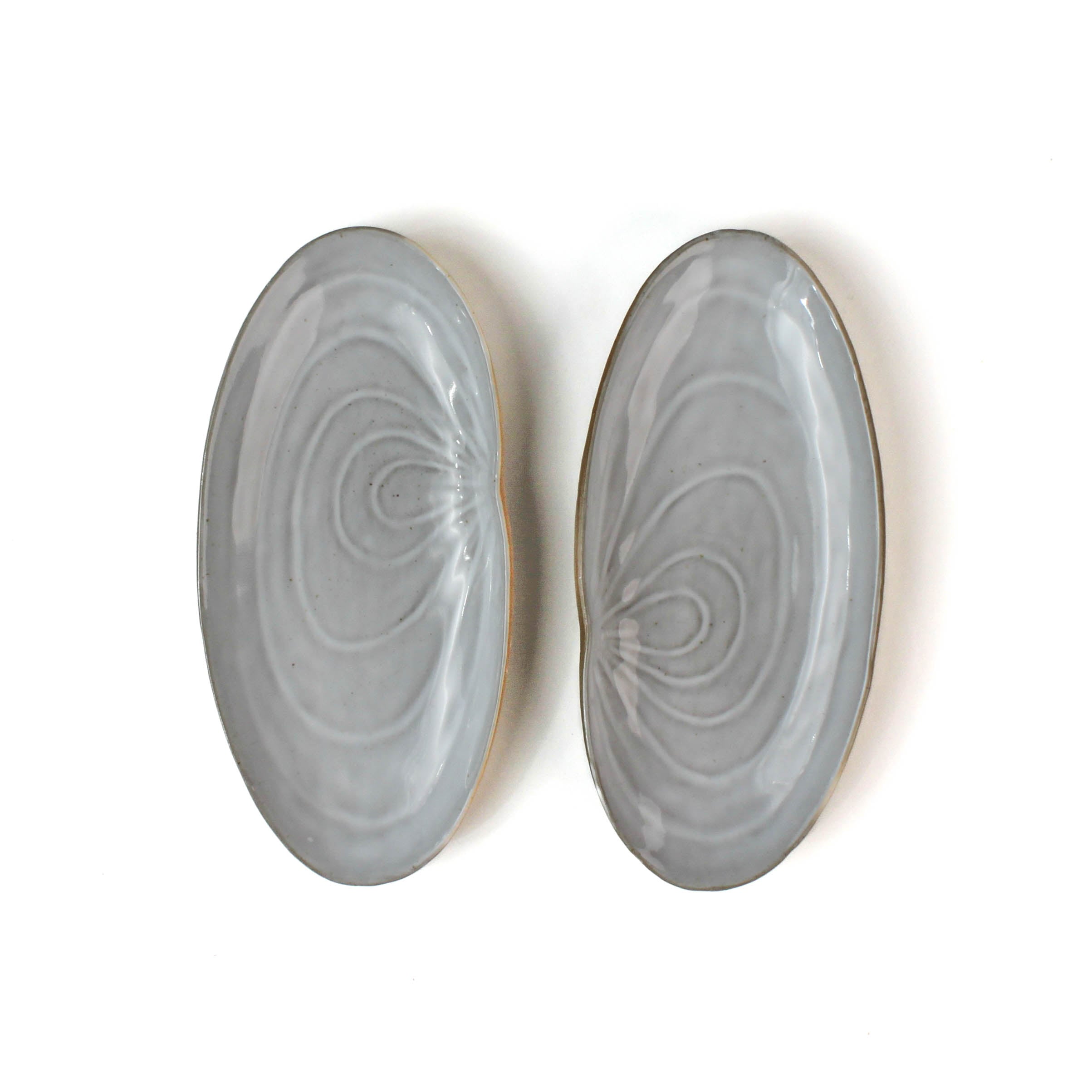 Shell shaped plate cream colored