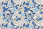 Lemon and strawberry wallpaper in blue and white motifs against a grey background