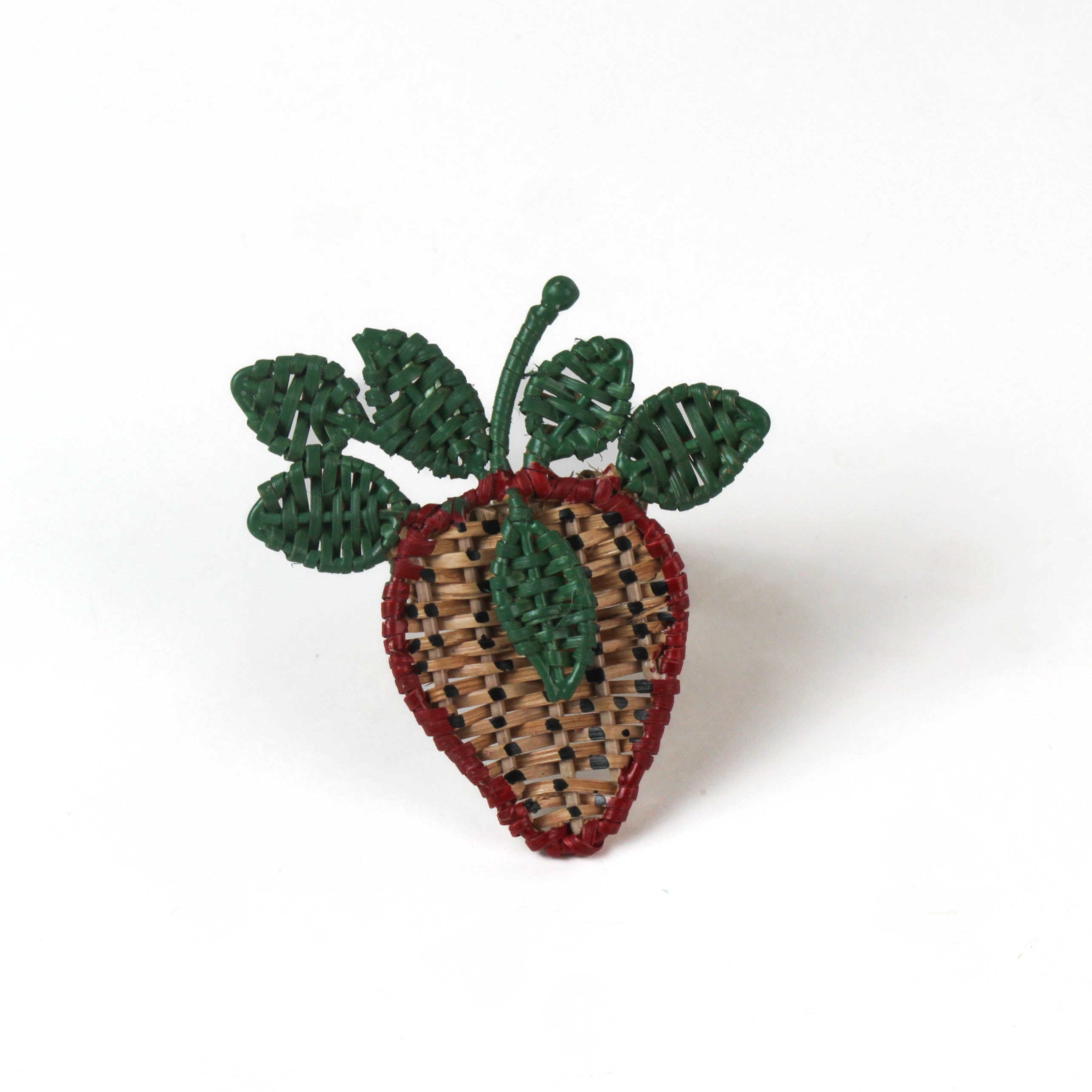 rattan strawberry napkin ring with a green leaves and a red outline on a white background. 